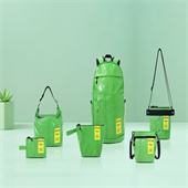 定做輕便可水洗牛皮紙背包抗穿刺雙肩電腦包塑織面料采用聚丙烯扁